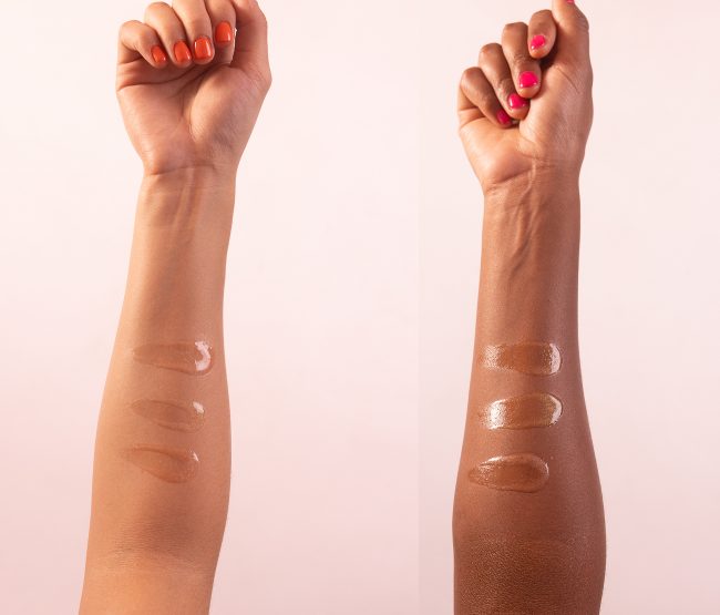 close up of body oil streaked on inside forearm of two different skin tones